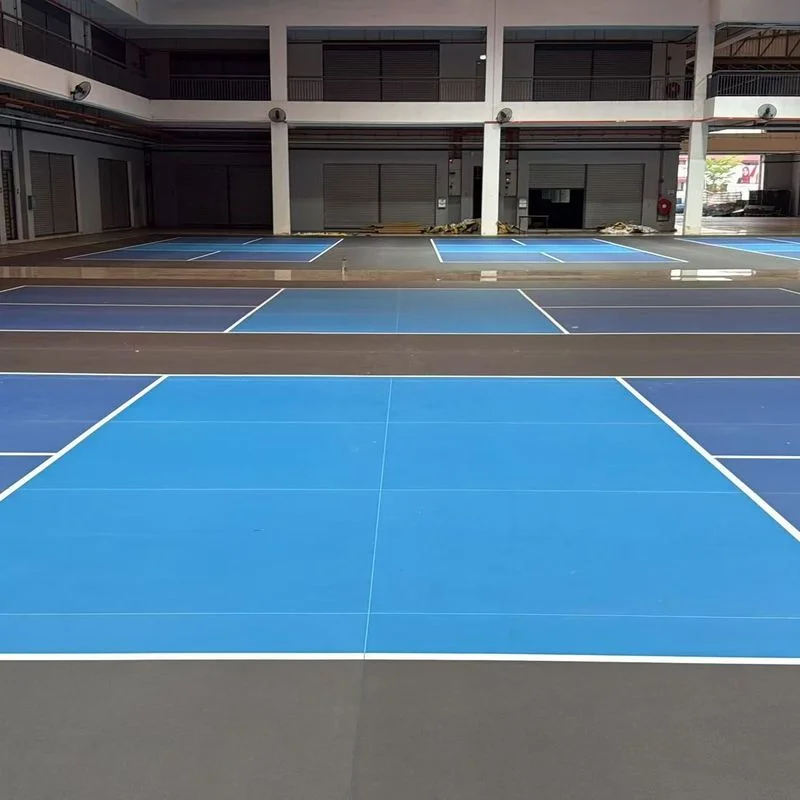 The TUCE Customized PVC Pickleball Floor offers a high-quality, wear-resistant, and non-slip surface, significantly reducing injury risks and simplifying maintenance. Its unique dense bottom structure is engineered to optimize pickleball bounce while providing moisture-proof and anti-shifting properties for enhanced durability and playability.