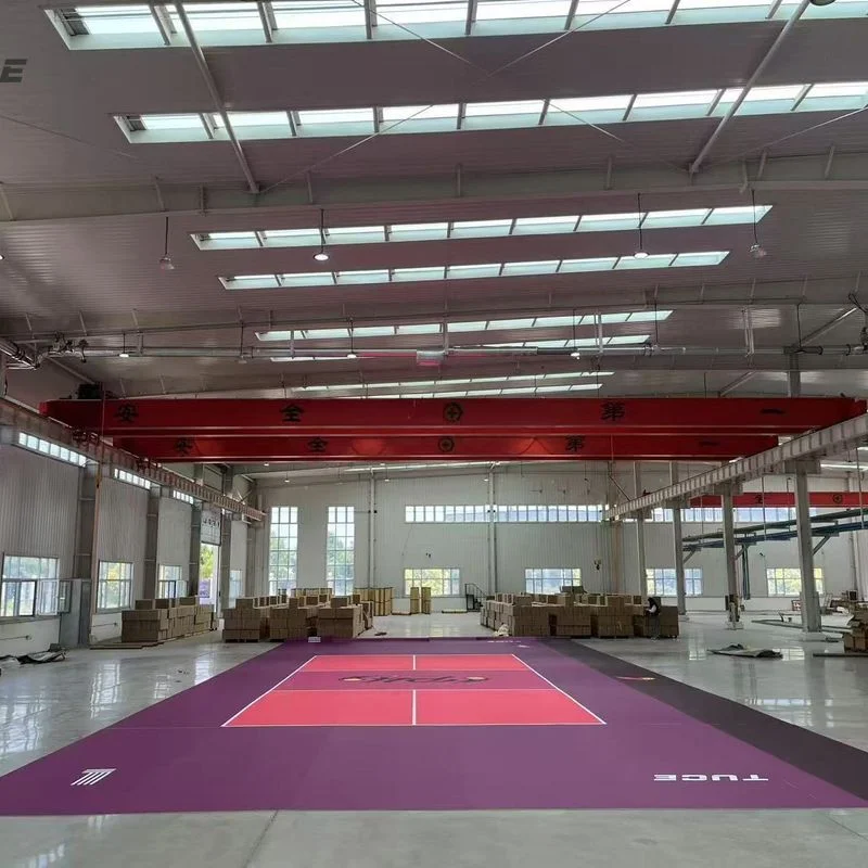 The TUCE Customized PVC Pickleball Floor offers a high-quality, wear-resistant, and non-slip surface, significantly reducing injury risks and simplifying maintenance. Its unique dense bottom structure is engineered to optimize pickleball bounce while providing moisture-proof and anti-shifting properties for enhanced durability and playability.