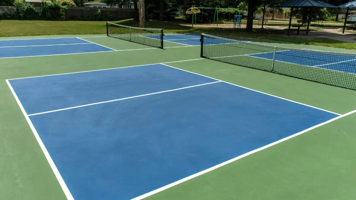 Permanent outdoor hard-acrylic pickleball court reference