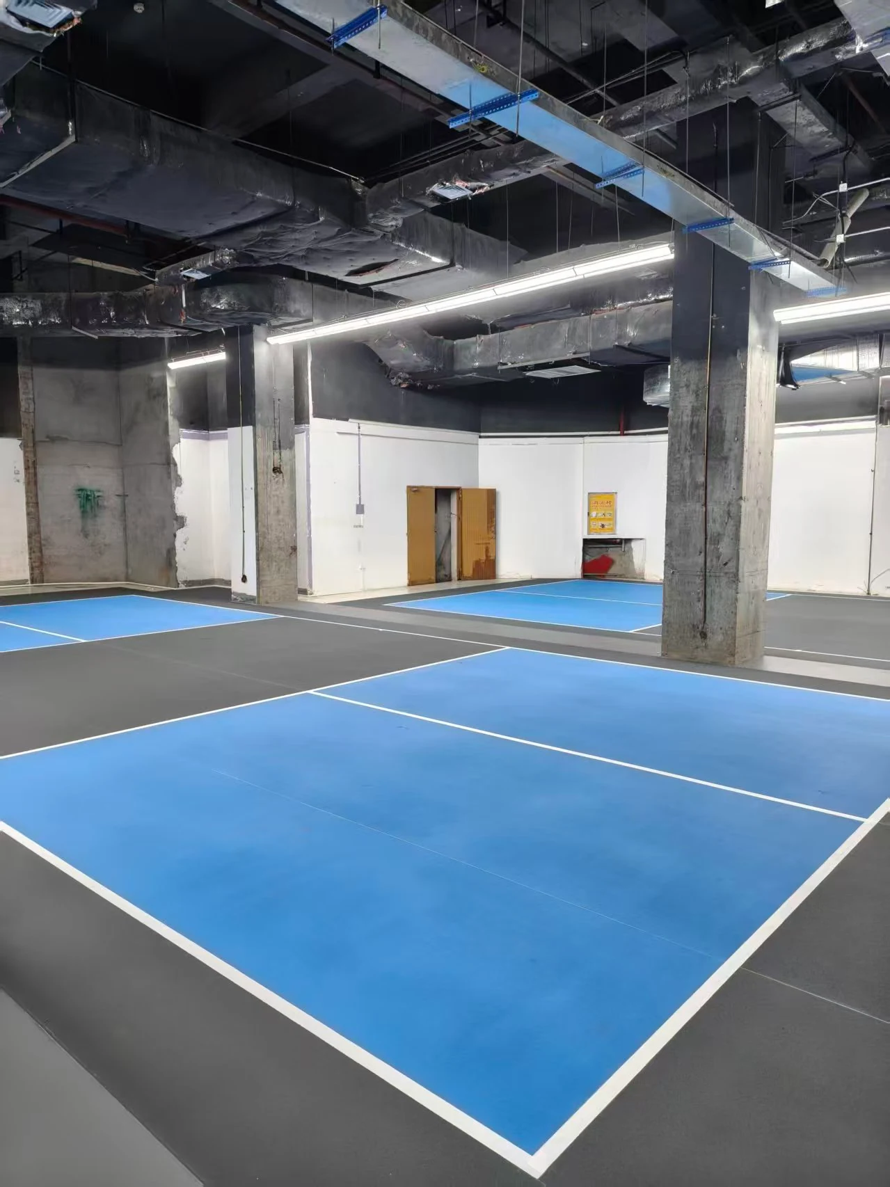 Acrylic-PVC composite flooring used in a premium indoor pickleball project